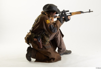  Photos Cody Miles Army Stalker Poses aiming gun kneeling whole body 0006.jpg
